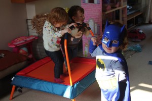 lucy-batman-playing