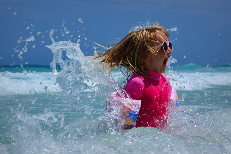 children-swimming-water-sea