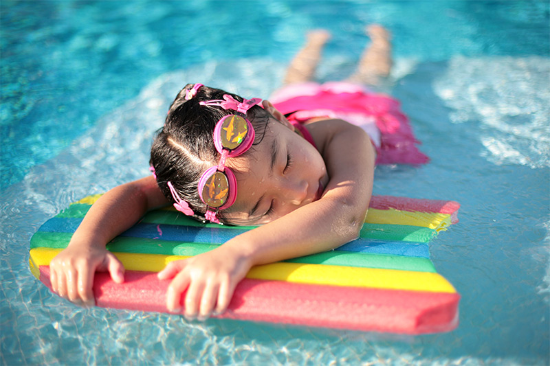 children-swimming-water