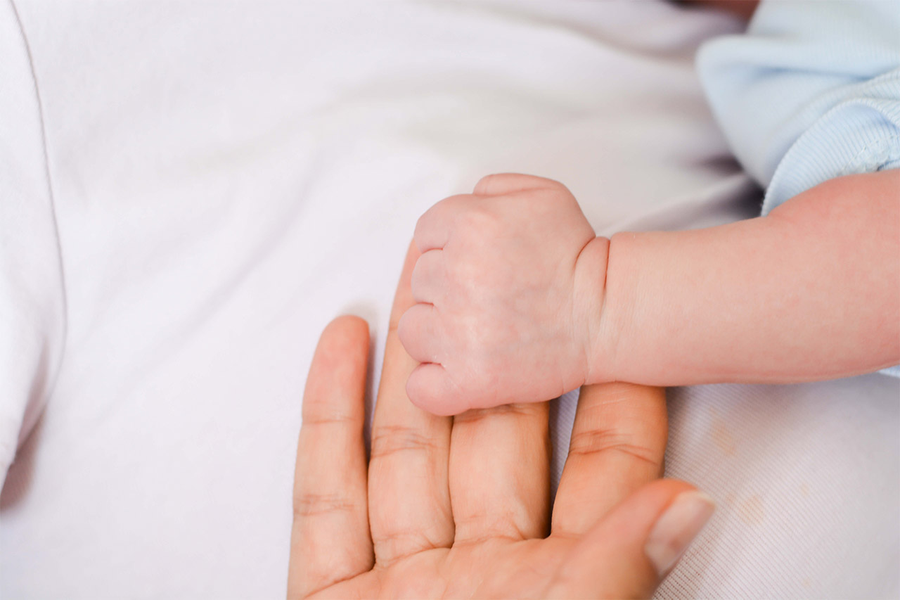 Baby hands shop bent at wrist