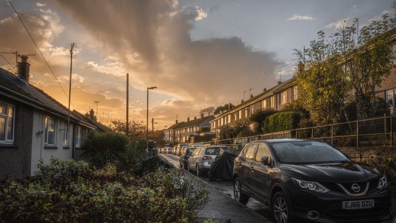 Family SUV parked on a driveway outside a UK home