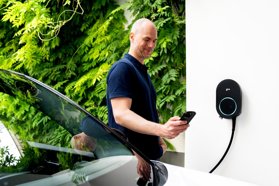 Electric car charging on a driveway at a UK home