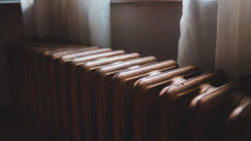 Modern white gas boiler installed in a UK home utility room