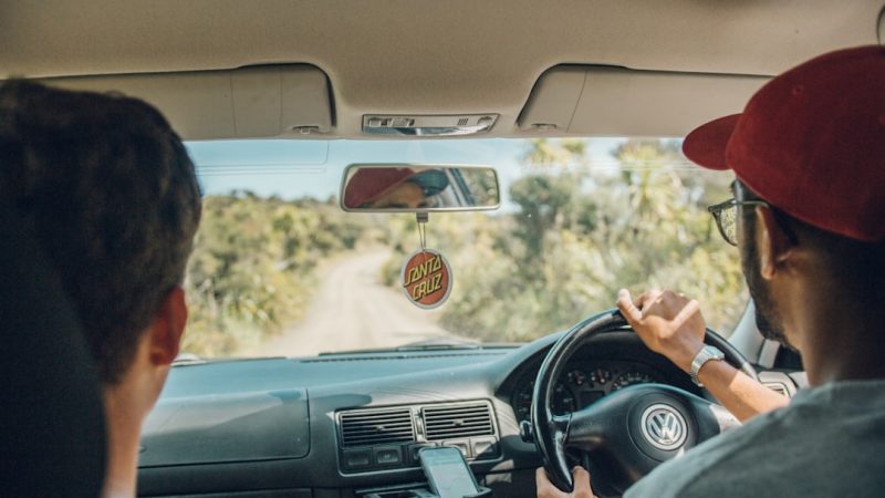 Teenager learning to drive with a parent in the passenger seat